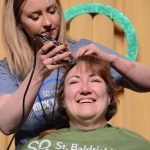 Woman-shaves-head-for-childhood-cancer